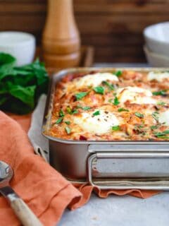 This spaghetti squash baked ziti is a healthier twist on the classic Italian dish yet still packed with that hearty, comforting and cheesy taste you love.
