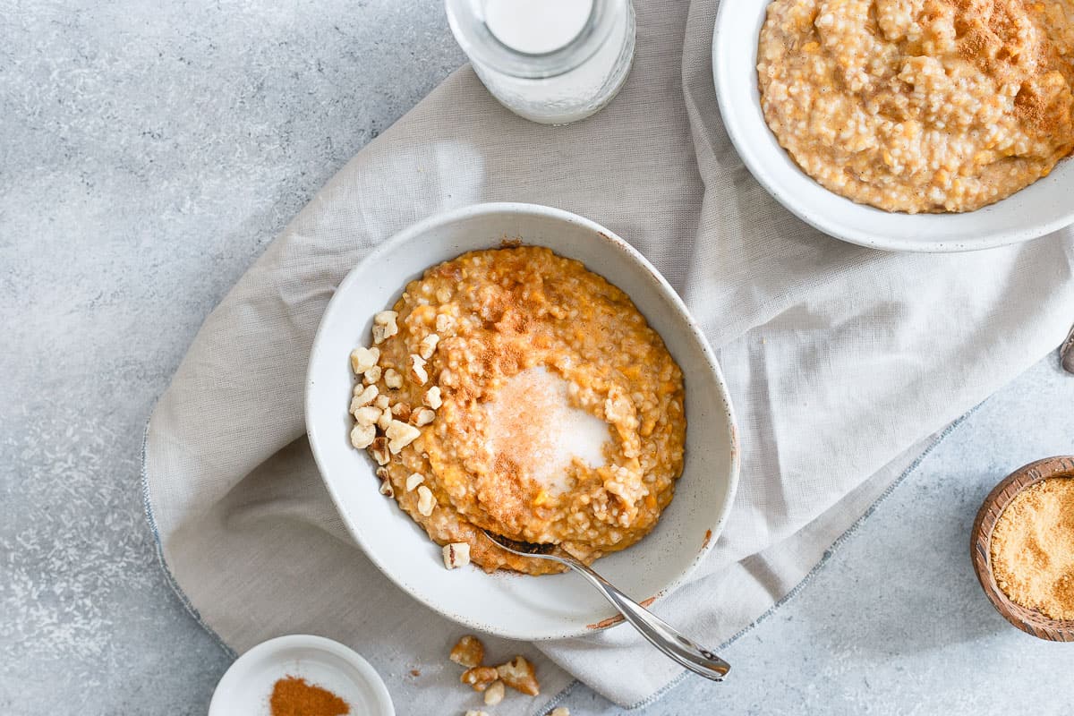 Pressure cooked sweet potato steel cut oats are creamy, just a little chewy and filled with raisins and winter spices for the perfect start to your day.