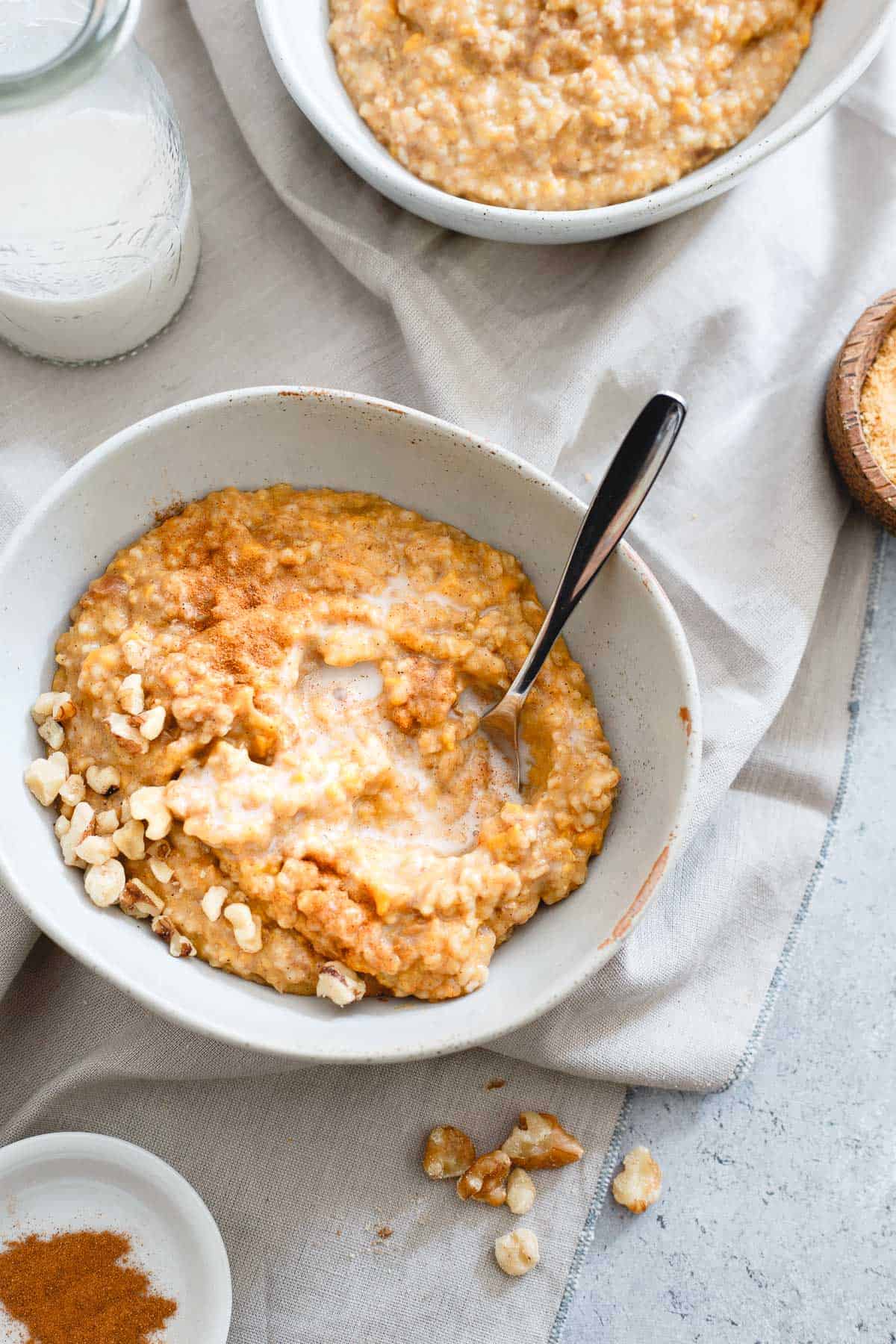 These cozy instant pot sweet potato steel cut oats are filled with golden raisins and warming winter spices. Set it the night before and wake up to a bowl!