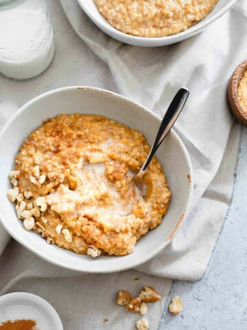 These cozy instant pot sweet potato steel cut oats are filled with golden raisins and warming winter spices. Set it the night before and wake up to a bowl!