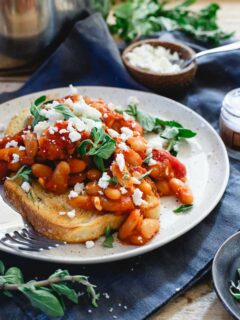 Instant Pot tomato white beans are made in a fraction of the time by using a pressure cooker. It's a hearty winter meal perfect over some toasted sourdough bread.