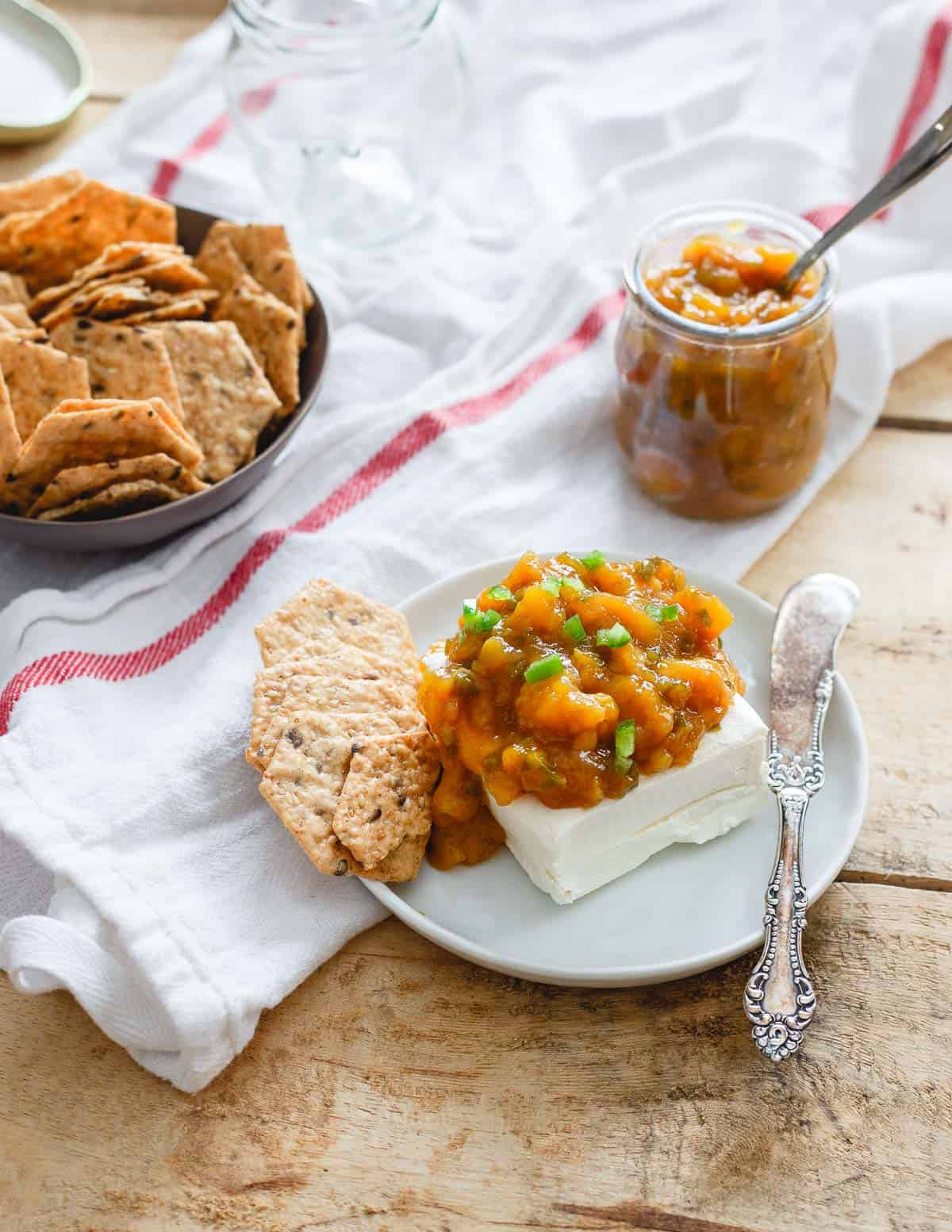 This jalapeno mango jam is the perfect balance of sweet and spice. It's equally delicious with some soft cheese and crackers as it is swirled in some yogurt!