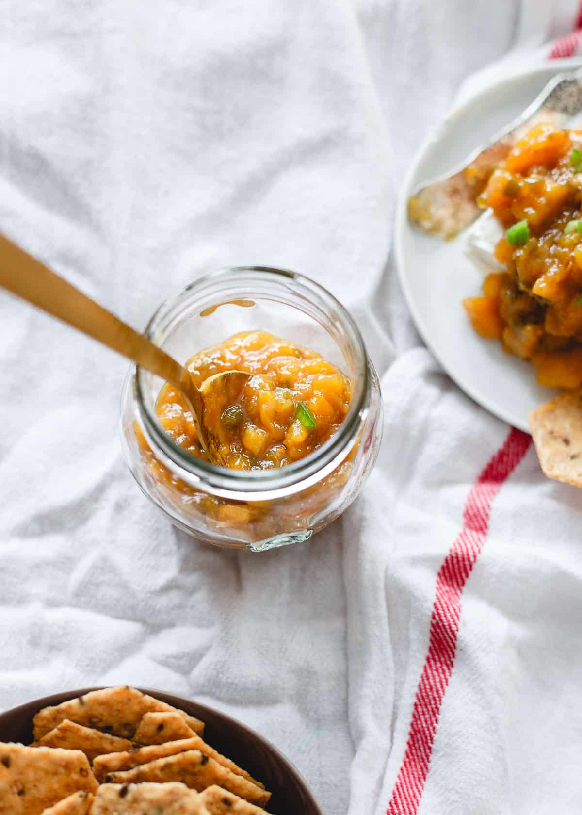 This jalapeno mango jam comes together in just minutes on your stove top and makes a versatile sweet or savory snack addition!