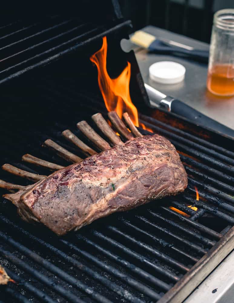 American lamb rib chops are grilled with a sweet peach honey.