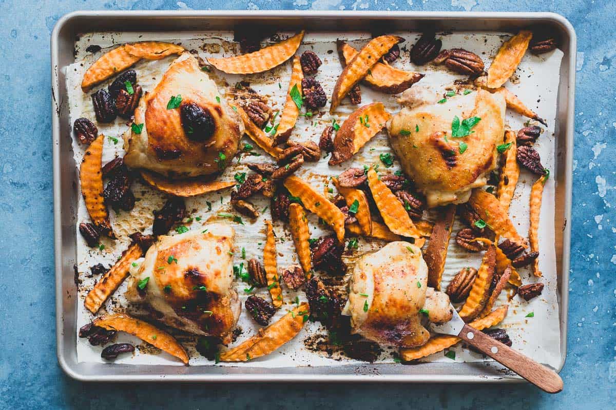 This chicken with roasted sweet potatoes and caramelized pecans is a snap. Make everything on one sheet pan and dinner is ready in no time!