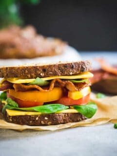 This BLTC sandwich draws inspiration from all the delicious late summer produce using heirloom tomatoes and fresh basil for a seasonal twist to the classic on seedy multigrain bread.