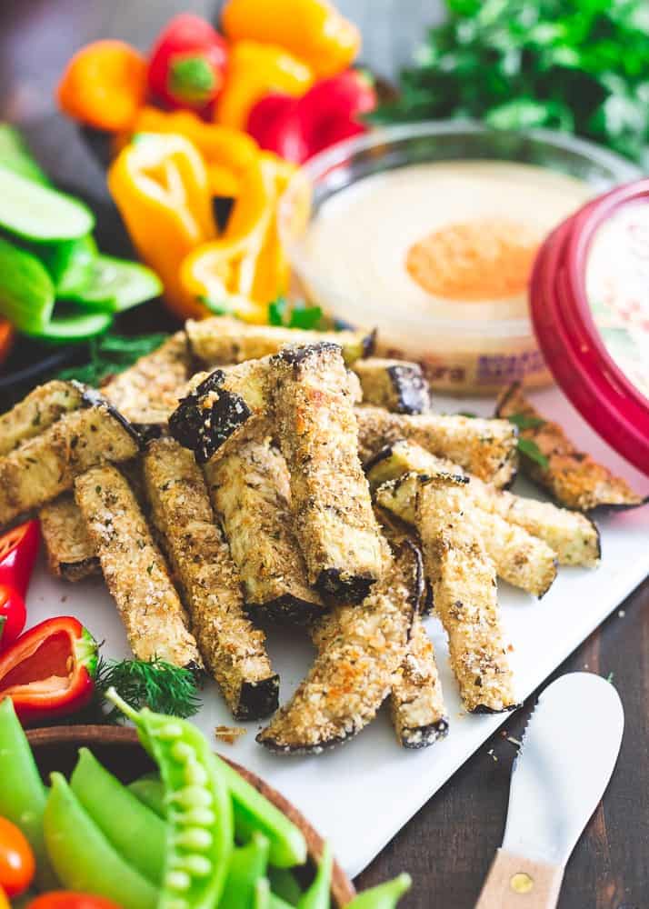 These eggplant fries are coated in breadcrumbs and parmesan with lots of flavorful Italian spices. Baked until crispy, they make a perfect vegetable dipper!