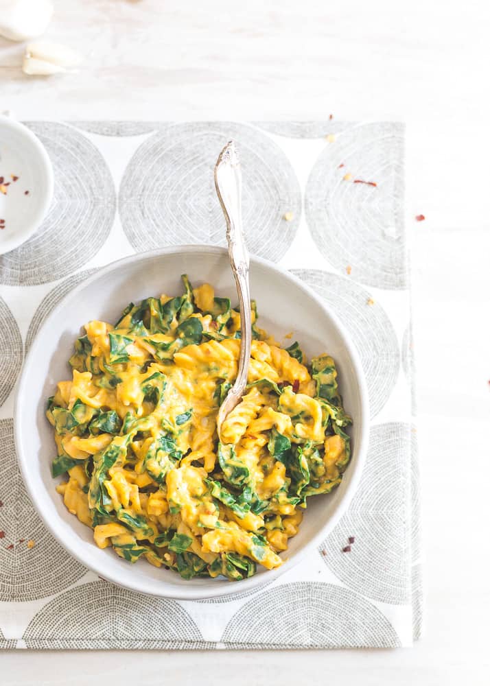 With fresh pumpkin, fall spices and tuscan kale, this creamy pasta dish is packed with seasonal flavor and a quick healthy dinner option.