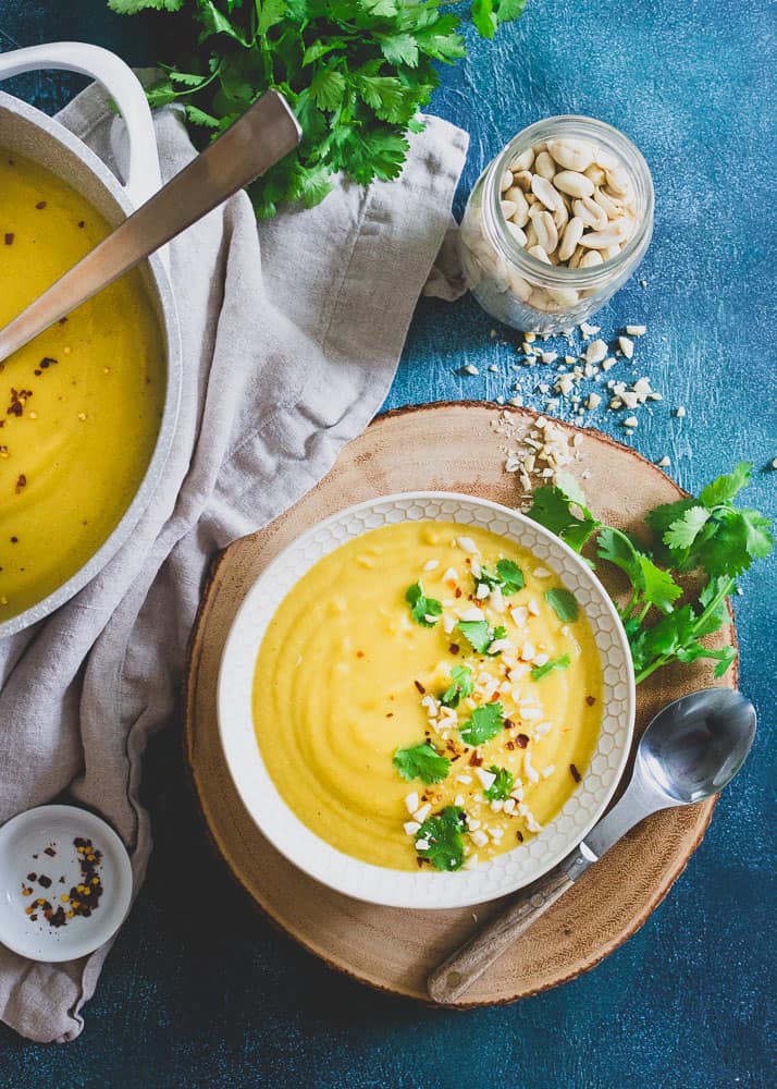 This savory creamy coconut delicata squash soup has a light, subtly sweet undertone that's the perfect bowl of comfort for a cold fall or winter day.