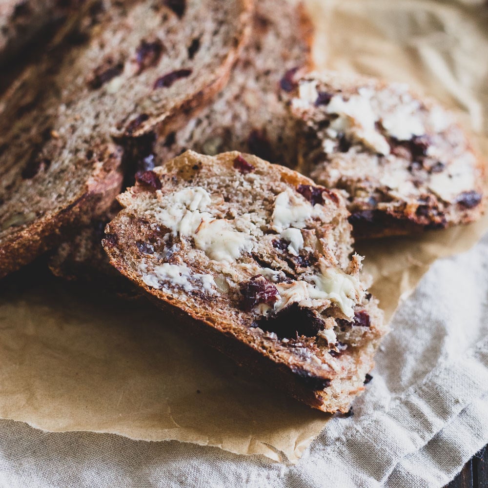 Cranberries, walnuts and dark chocolate give this Dutch oven bread a hint of sweetness and the perfect loaf for your holiday table.