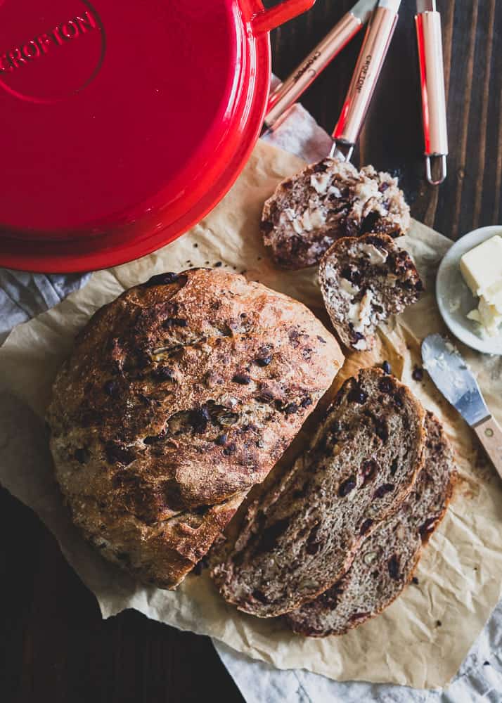 Cozy up with a slice of this cranberry, walnut and dark chocolate Dutch oven bread this winter.