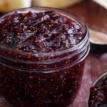 Fig preserves in a glass jar.