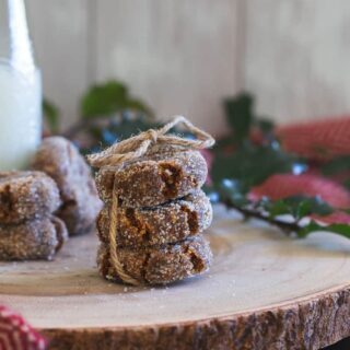Stacked gingerbread collagen cookies tied with twine.