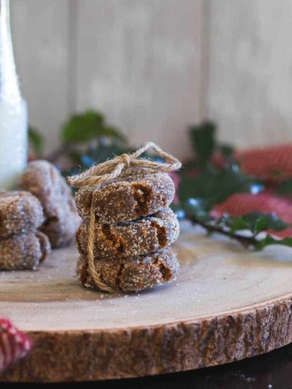 Stacked gingerbread collagen cookies tied with twine.