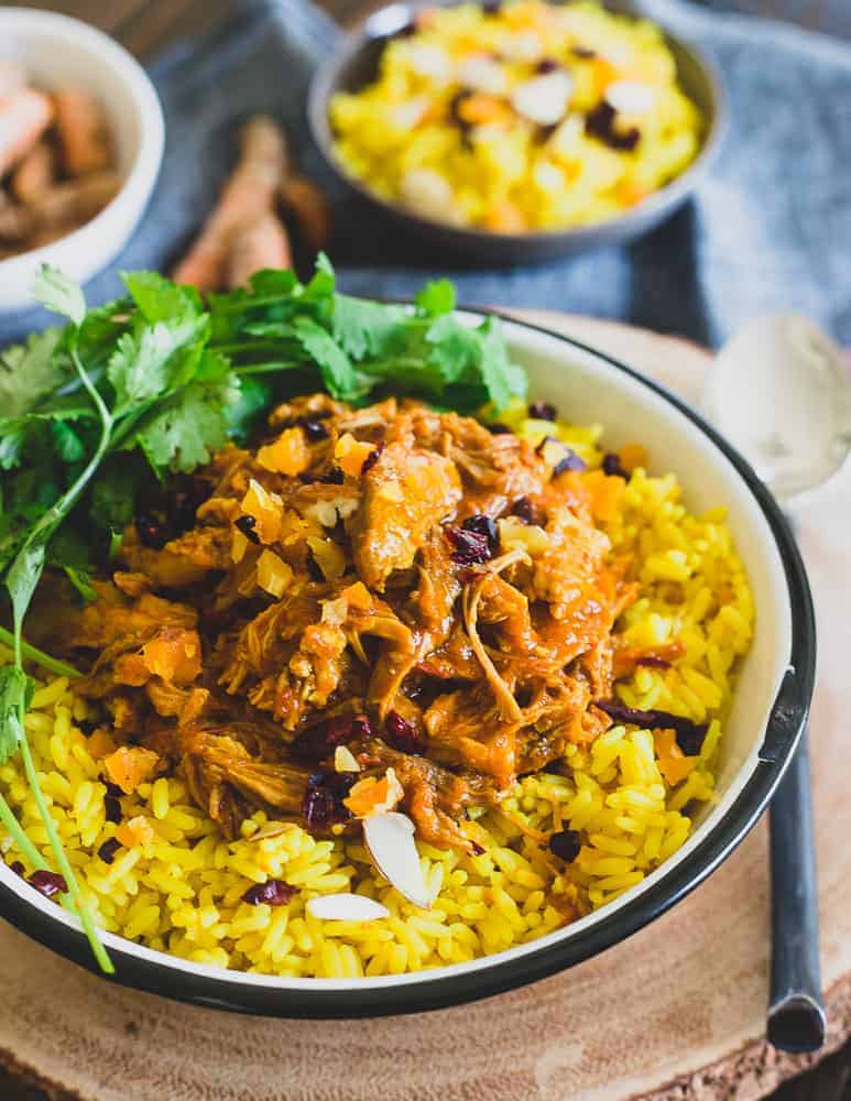 Aromatic spices and creamy coconut milk make this Instant Pot coconut pork absolutely delicious over turmeric and ginger rice.