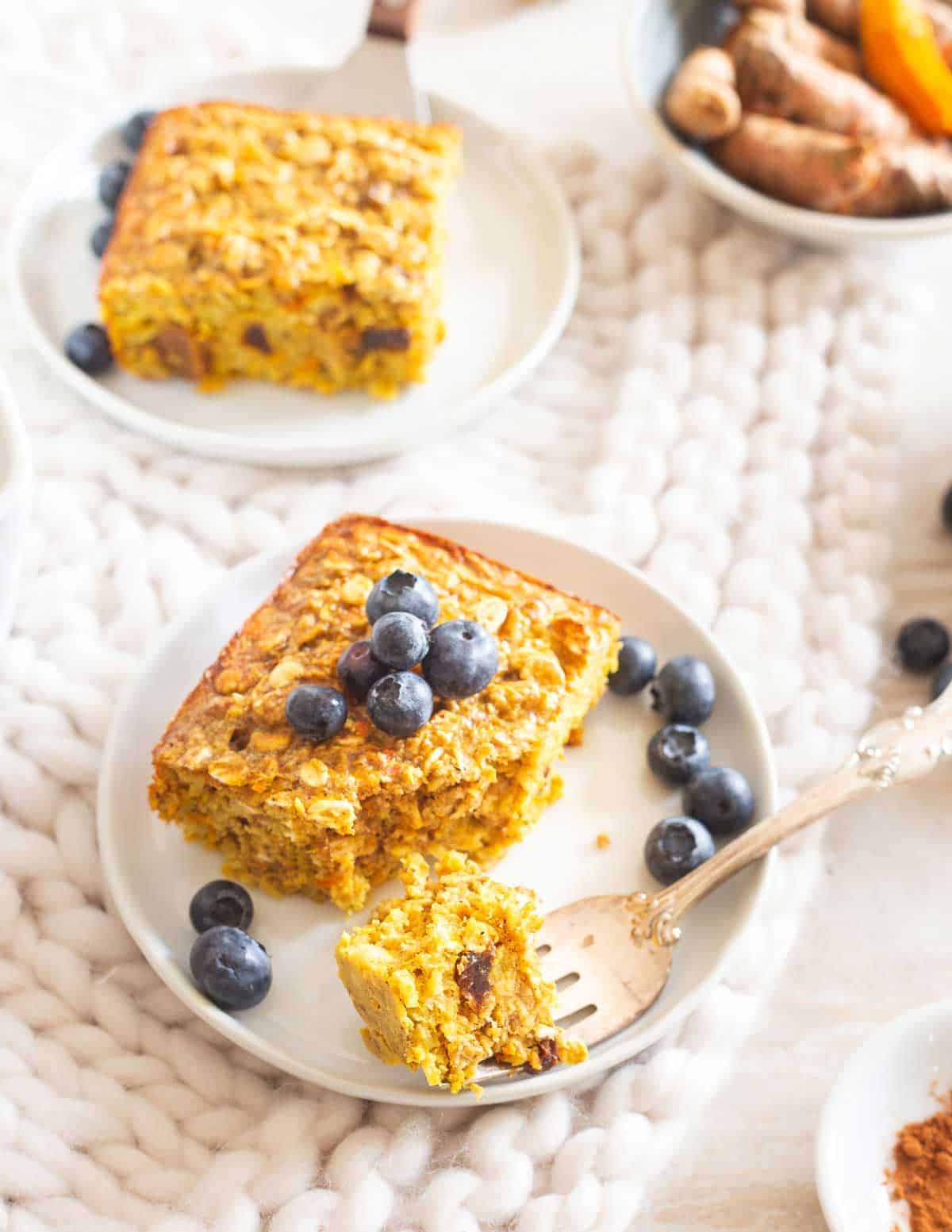 Baked turmeric oatmeal is studded with cinnamon and raisins for a healthy and hearty anti-inflammatory breakfast and easy to make ahead.