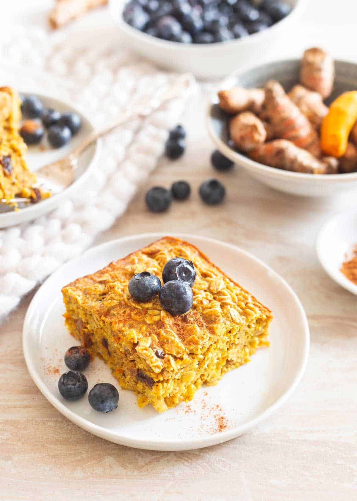 Golden baked oatmeal made with fresh turmeric is healthy, delicious and perfect for breakfast meal prep!