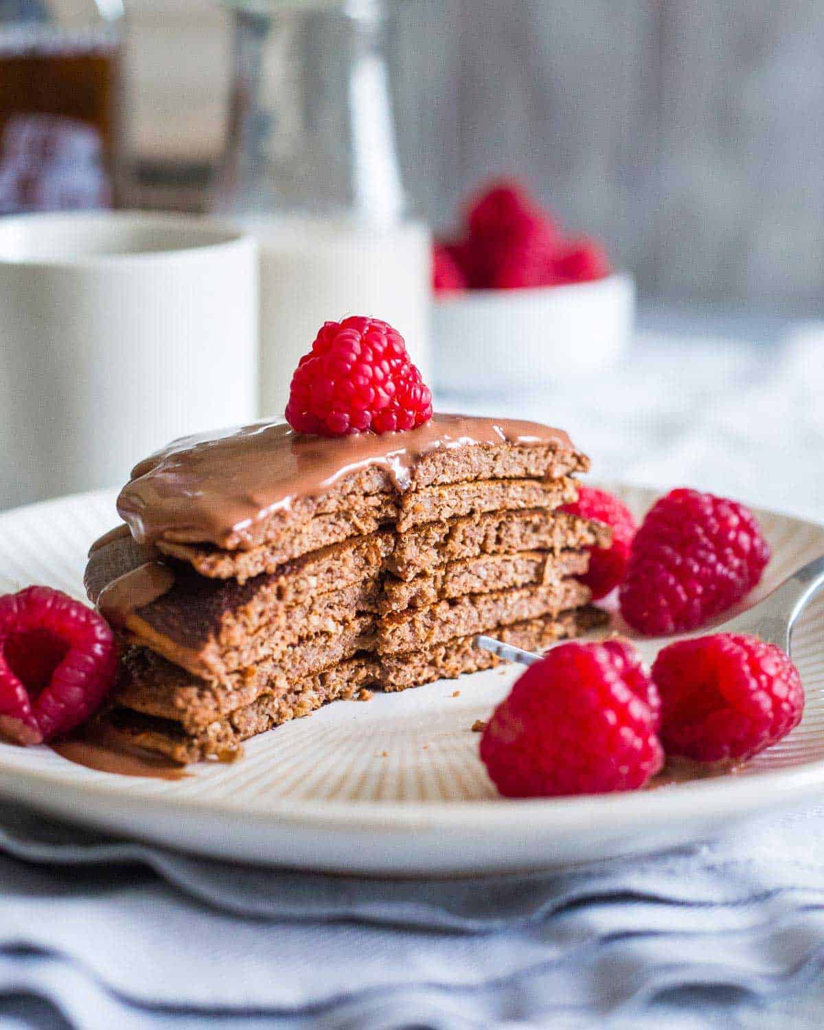 Full of chocolate flavor and with a delicious chocolate sauce on top, these protein pancakes taste more like dessert than a healthy breakfast!