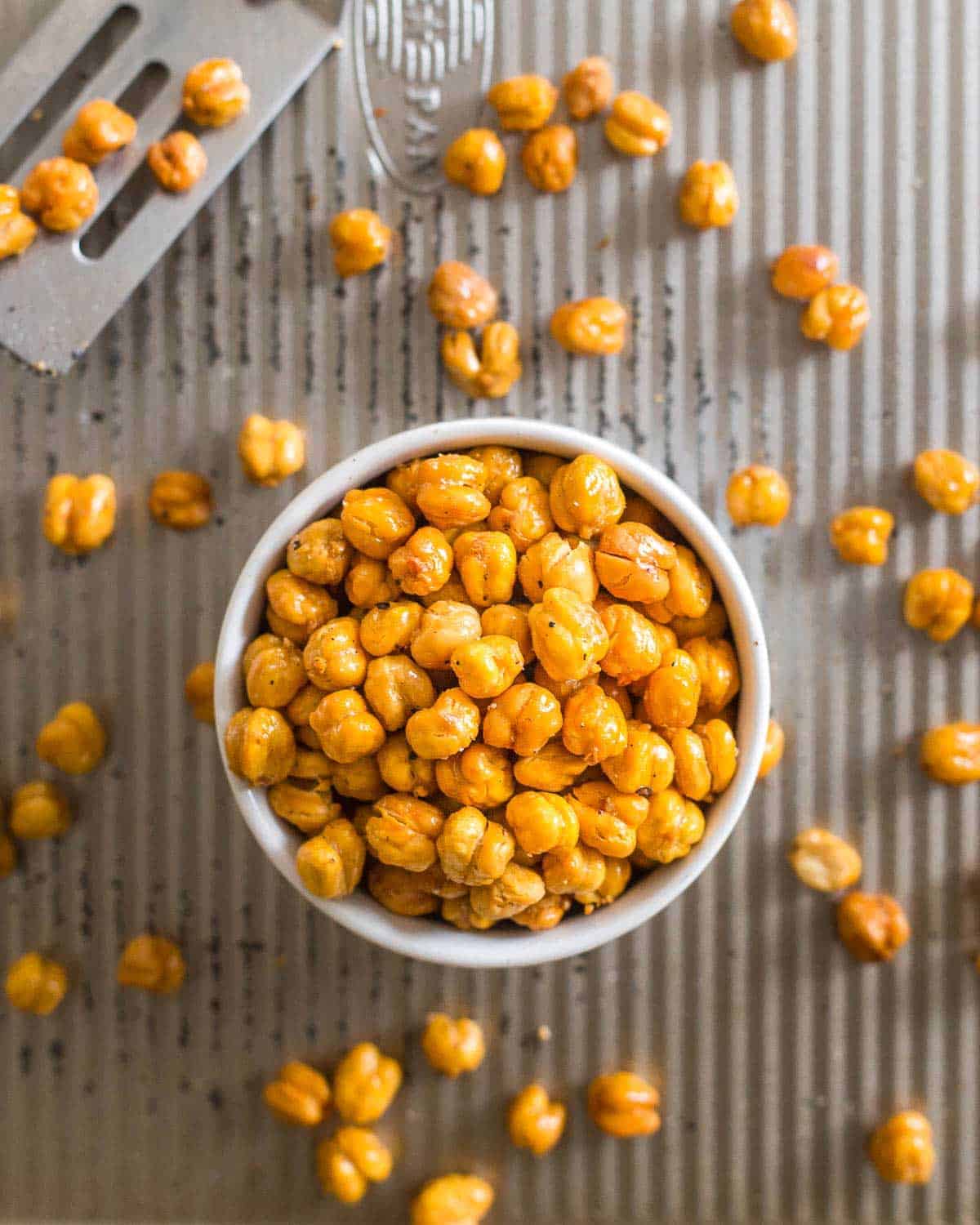 Roasted chickpeas are snack-worthy little protein-packed bites that make a fun appetizer alternative to nuts or a great salad topper. 