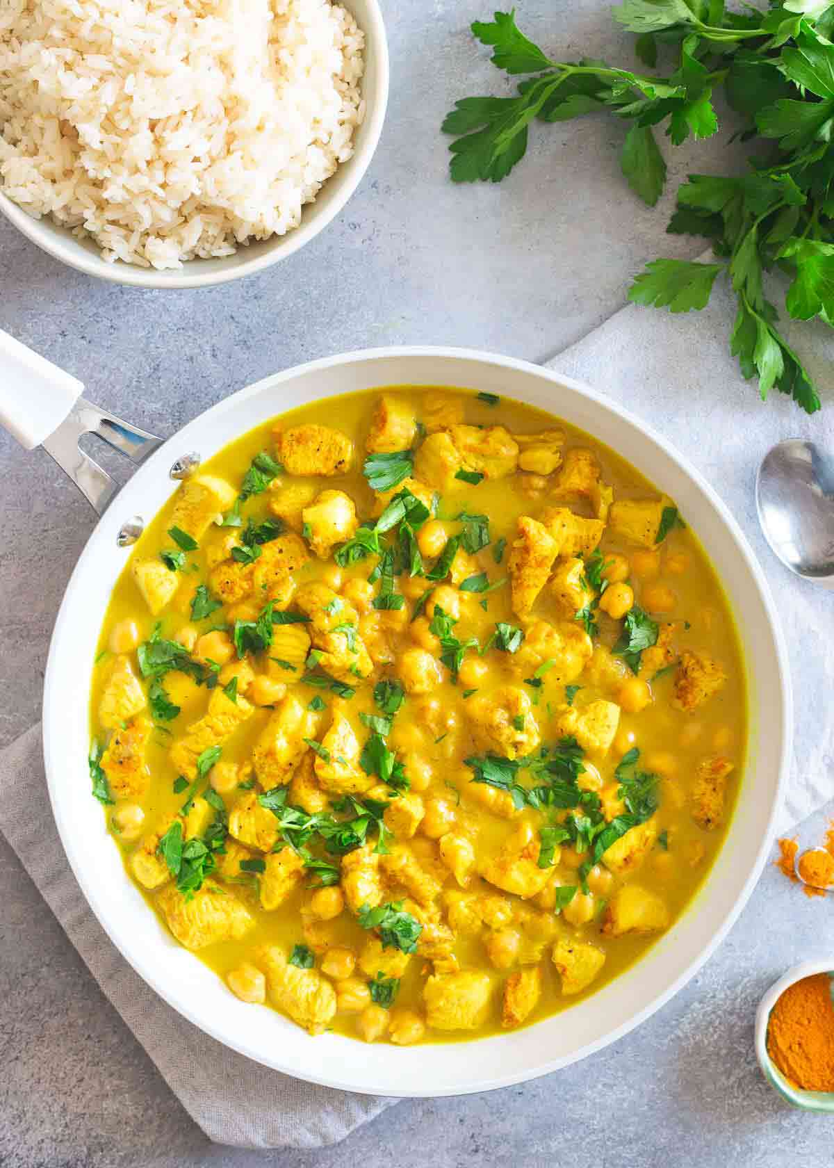 This 30 minute turmeric chicken dinner is made all in one skillet with just a handful of ingredients!