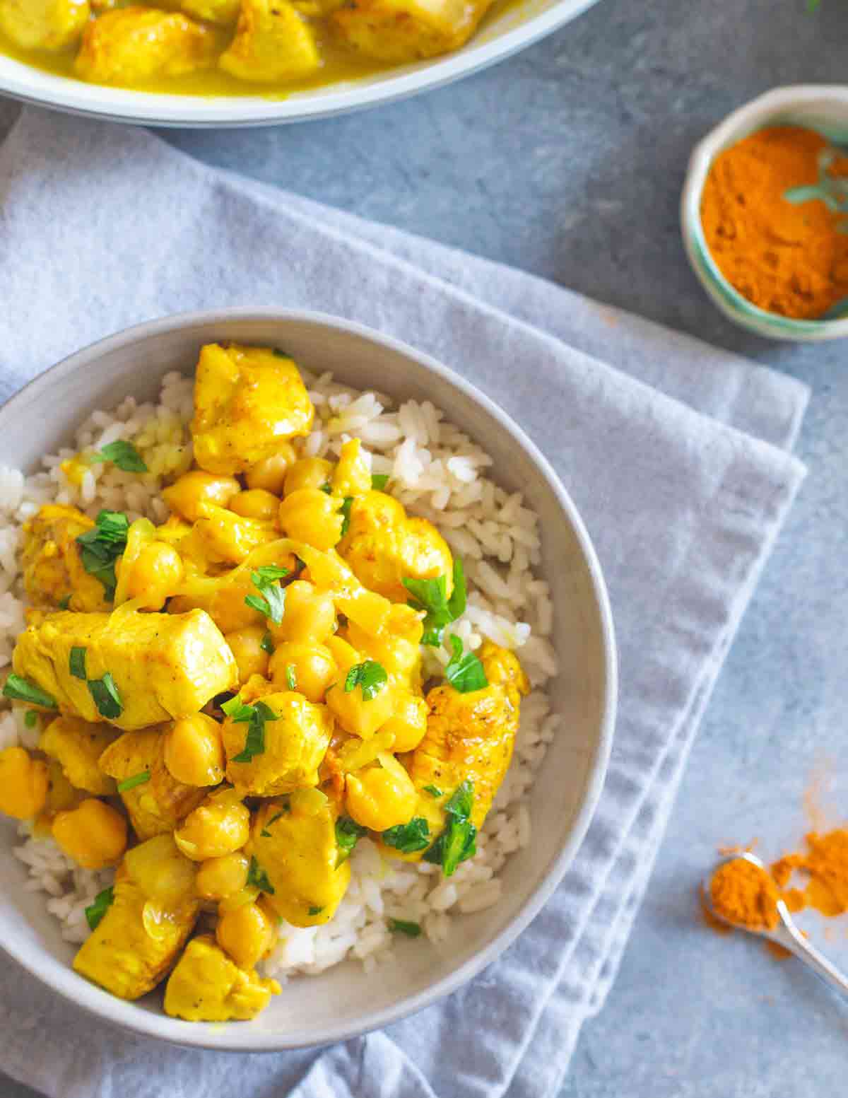 This turmeric chicken recipe is creamy and hearty with chickpeas and made in just 1 skillet in under 30 minutes.