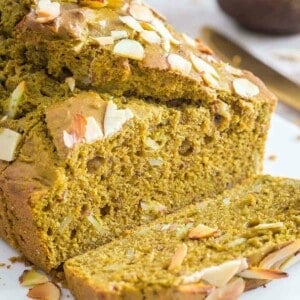 Matcha bread loaf with a slice.