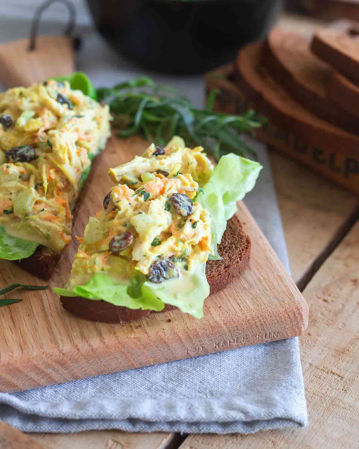 Sweet raisins and cinnamon complement savory turmeric and tarragon in this chicken salad.