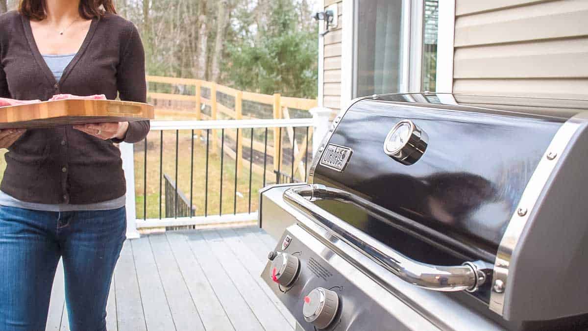 Grilled pork chops with fennel grape salad made on the Weber Genesis ii 315 grill.