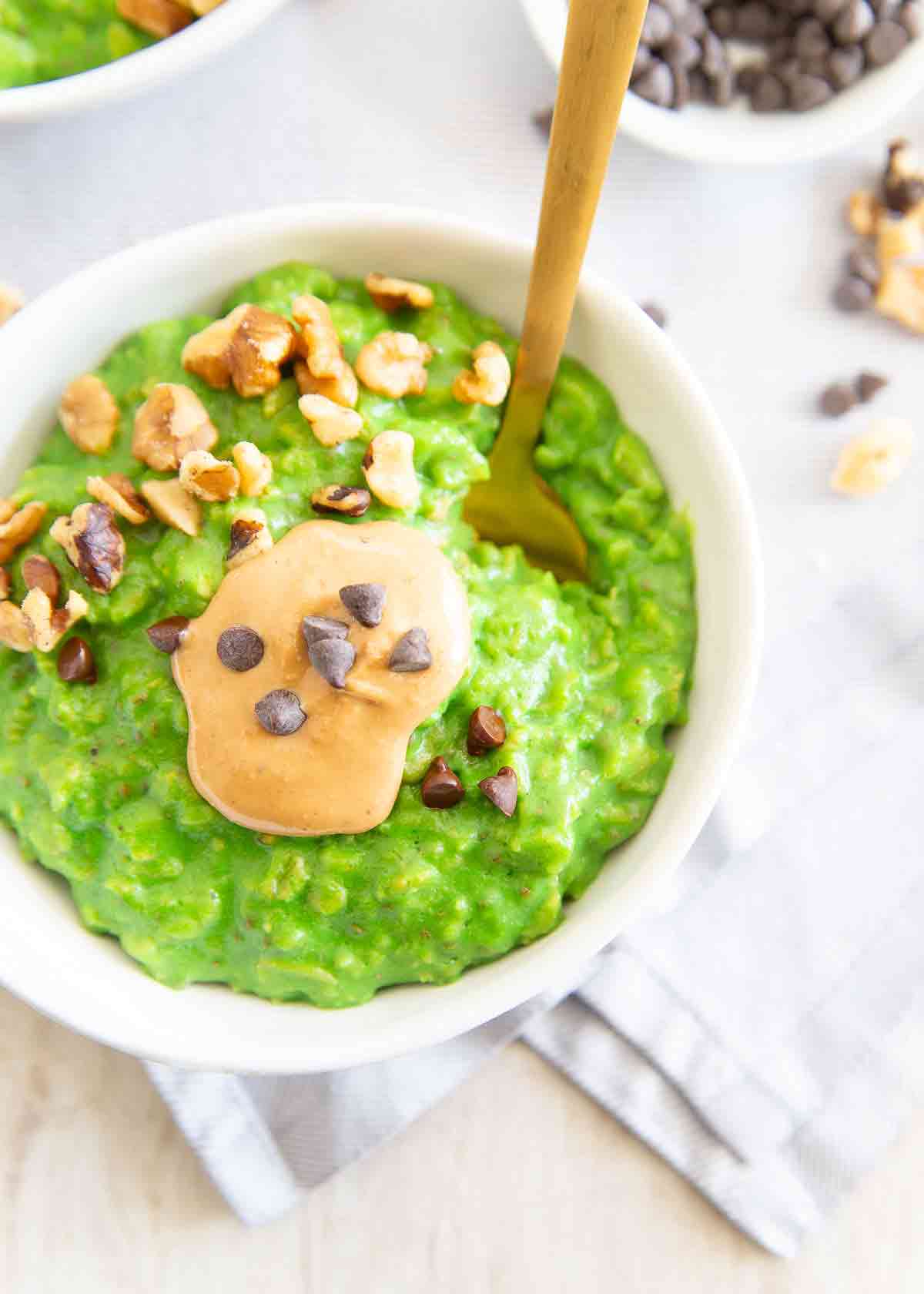 Oatmeal made with spinach makes a fun green breakfast perfect for celebrating St. Patrick's Day.