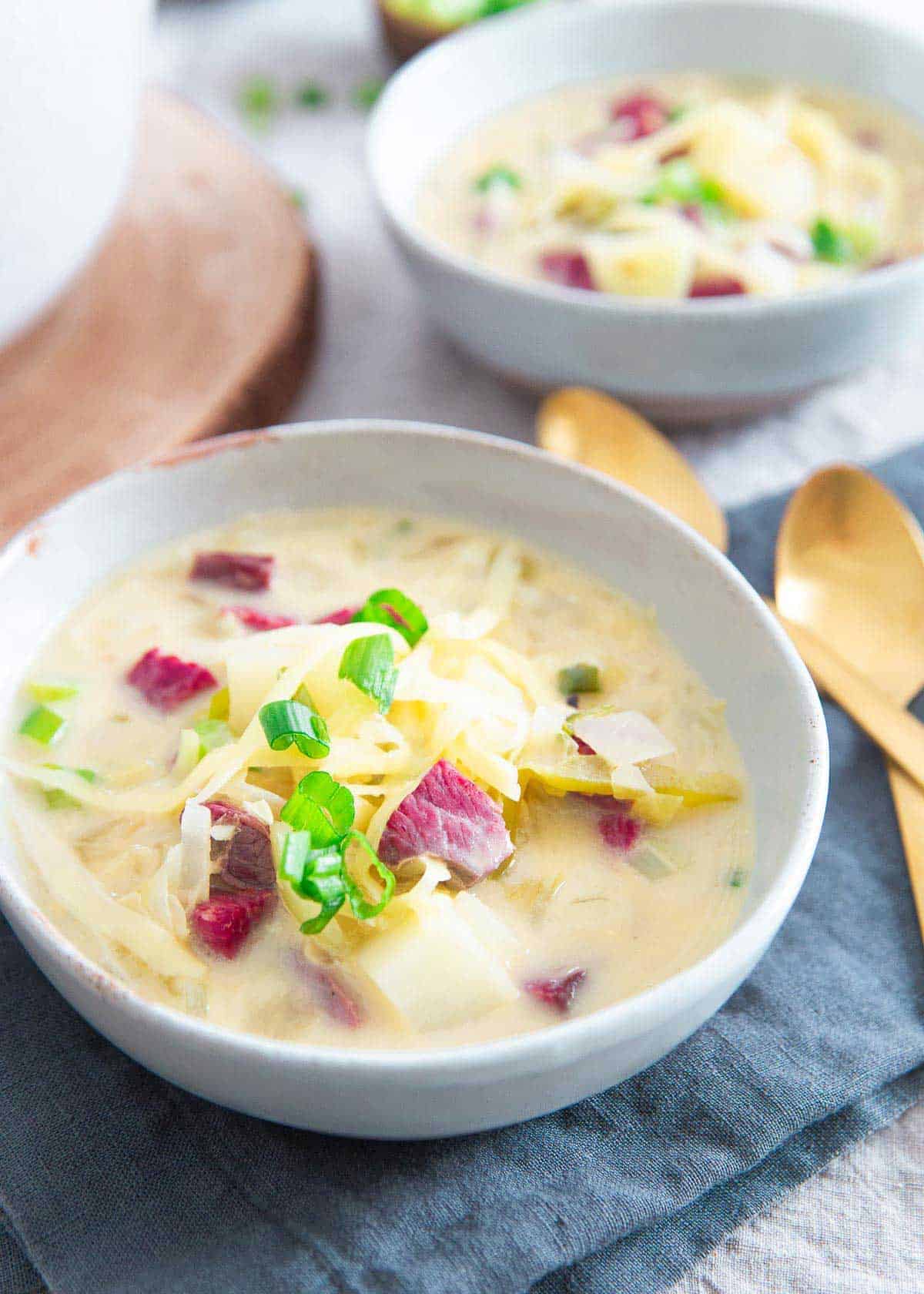 Reuben soup combines corned beef, potatoes, sauerkraut and Swiss cheese in a simple creamy dish. It's the perfect way to use up St. Patrick's Day leftovers!