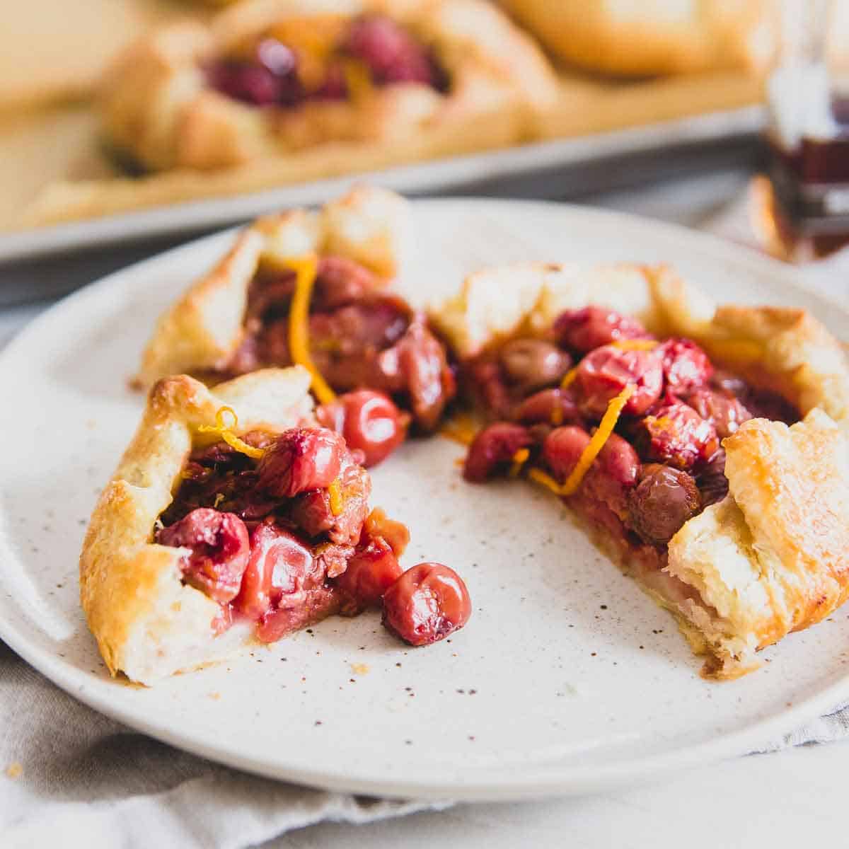 Next time you're craving cherry pie, try one of these mini sour cherry galettes with orange zest and maple syrup.