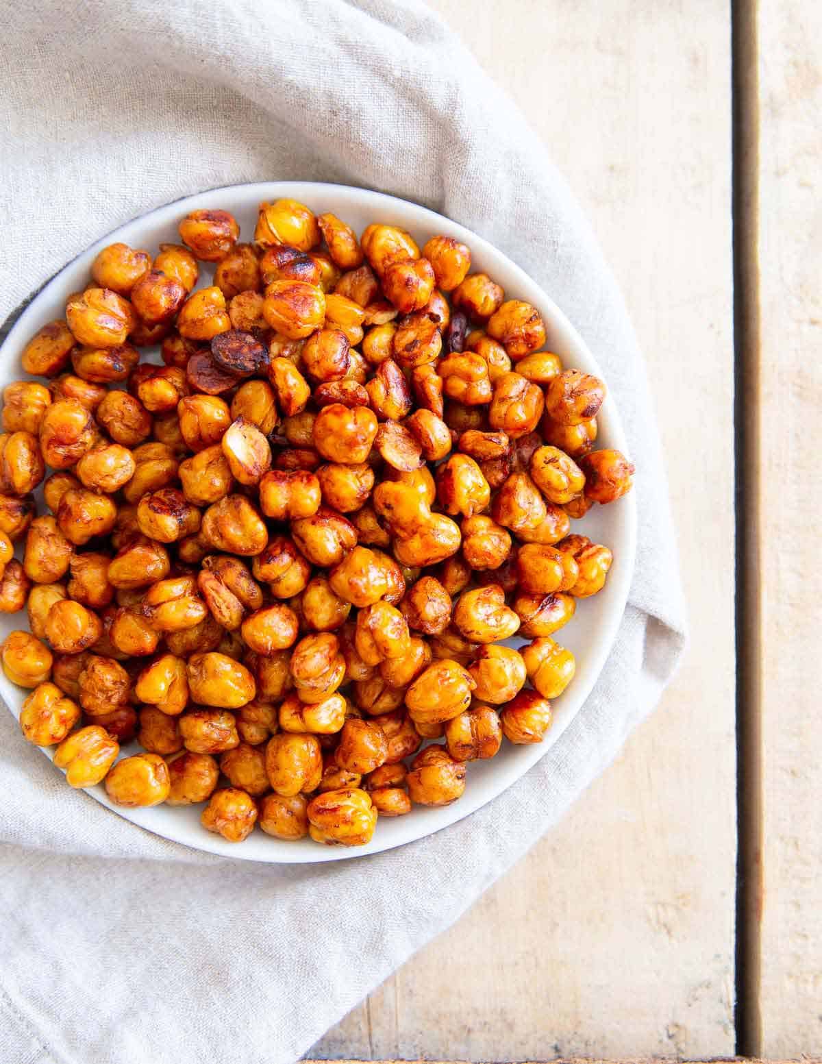 These easy, crispy, roasted BBQ chickpeas make a delicious option for healthy snacking or the perfect crunchy topper for salads.