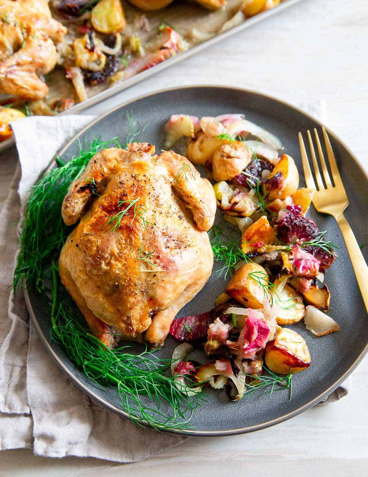 A stunning spring dinner, this easy sheet pan Cornish Game Hen recipe is packed with flavor.