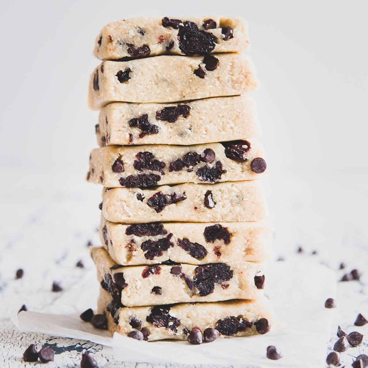 These no bake cookie dough bars are packed with chocolate chips and dried Montmorency tart cherries. A healthy snack that tastes as decadent as cookie dough!