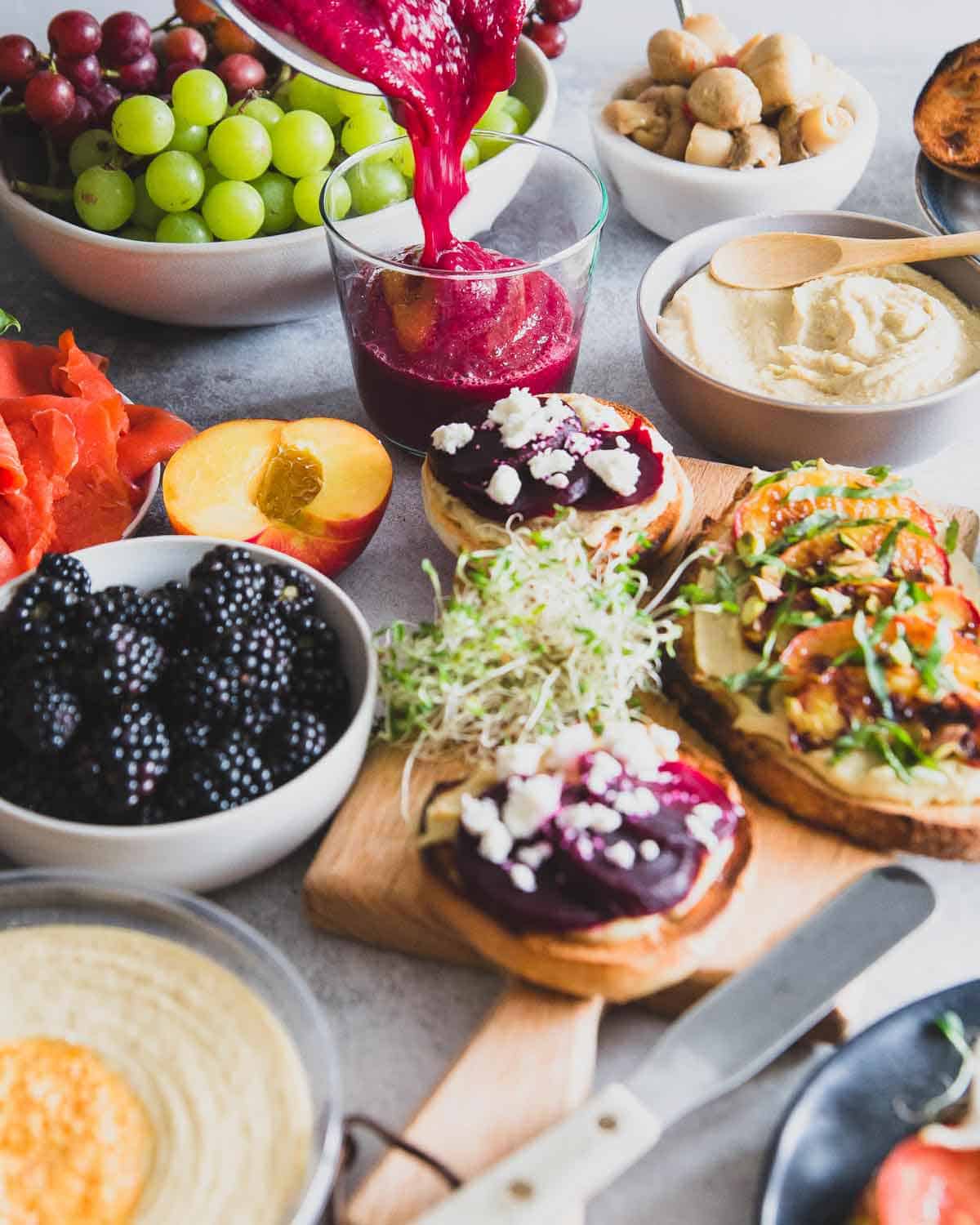 This simple beet smoothie recipe uses just a handful of fresh fruit and vegetables for a delicious and healthy drink perfect for breakfast or this hummus toast brunch spread.