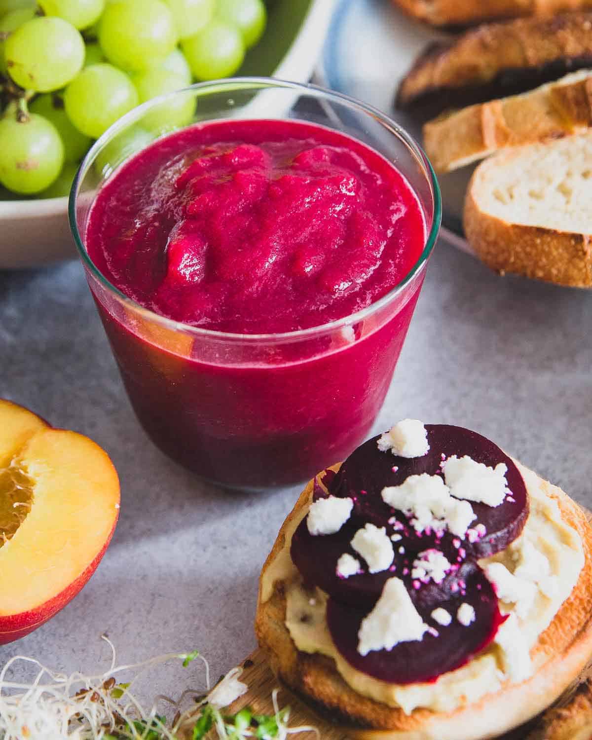 A simple red beet smoothie recipe that uses just a few fruits and vegetables easily found in the grocery store for a healthy start to the day.
