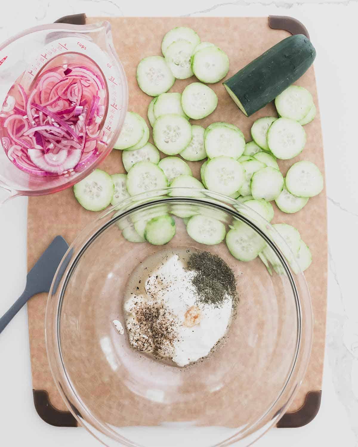 How to make an easy, refreshing and healthier creamy cucumber salad recipe for all your summer cookouts and parties!