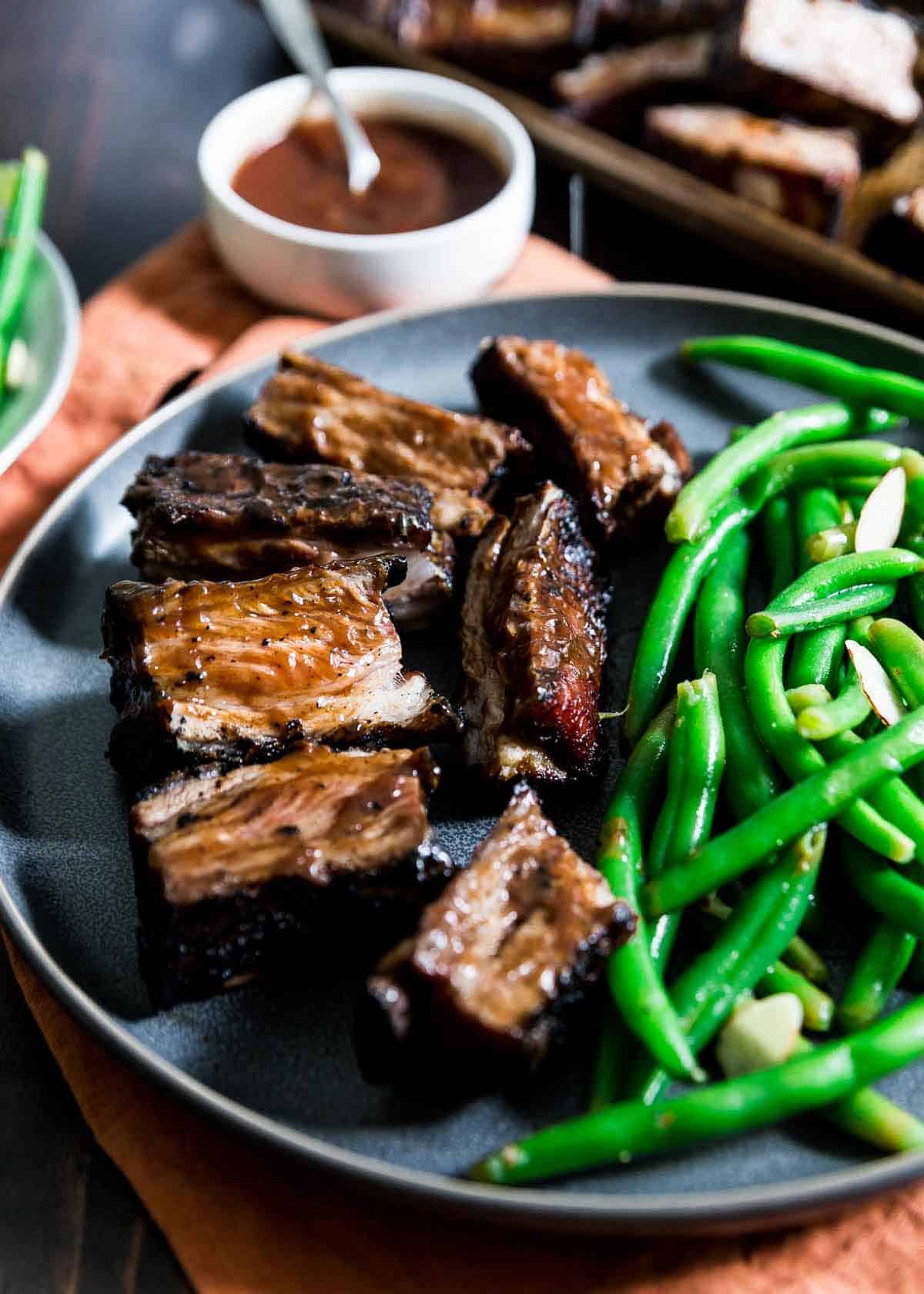 These lamb ribs are the easiest recipe to throw on the grill. Cooked low and slow over indirect heat then finished over a hot flame for crispiness they're packed with BBQ flavor!