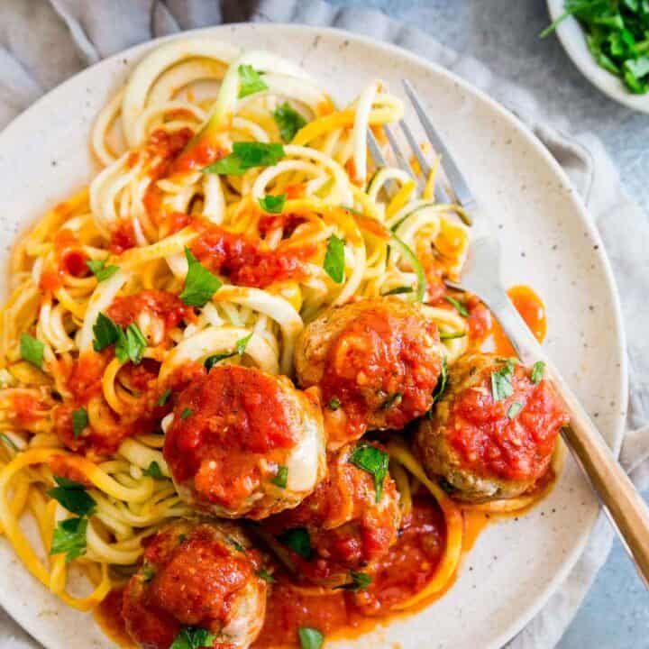 turkey zucchini meatballs stuffed with cheddar cheese in marinara sauce
