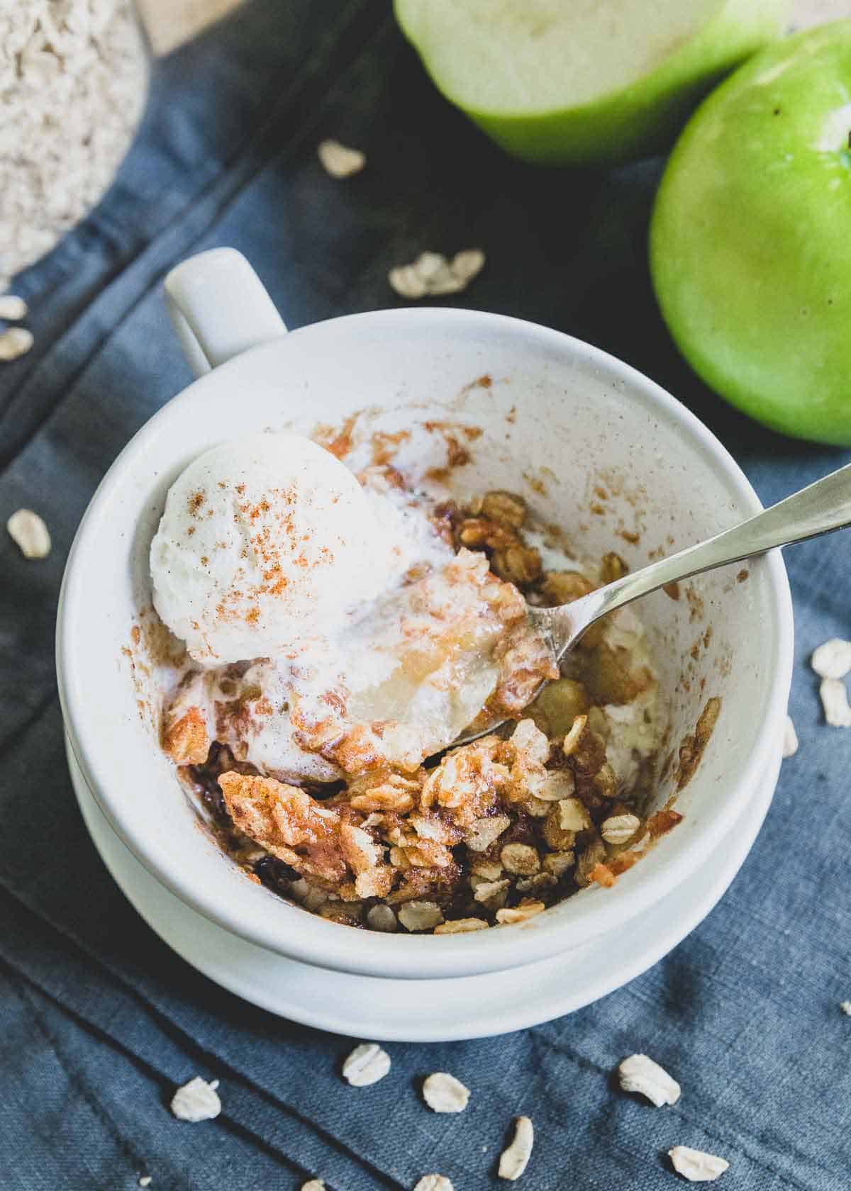 Quick and easy microwave apple crisp recipe that can be made in a mug or small ramekin to serve 1.