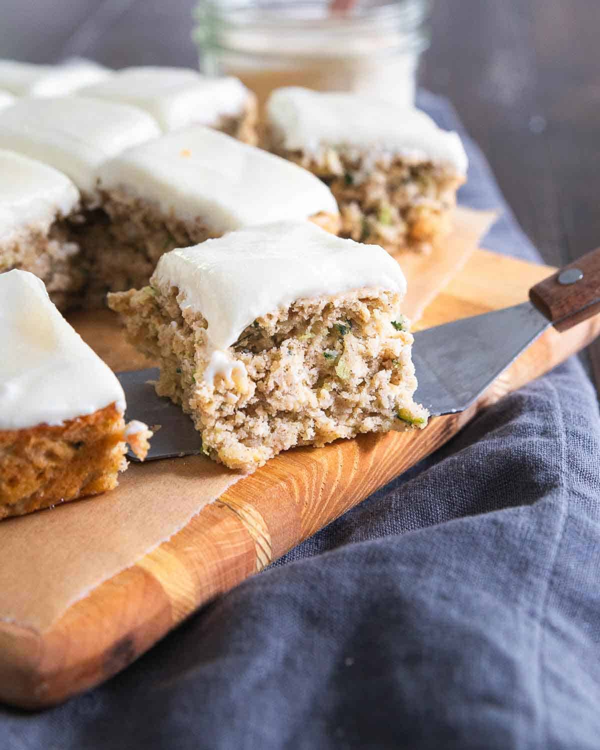 Healthy zucchini bars with cream cheese frosting make the perfect afternoon snack or dessert.