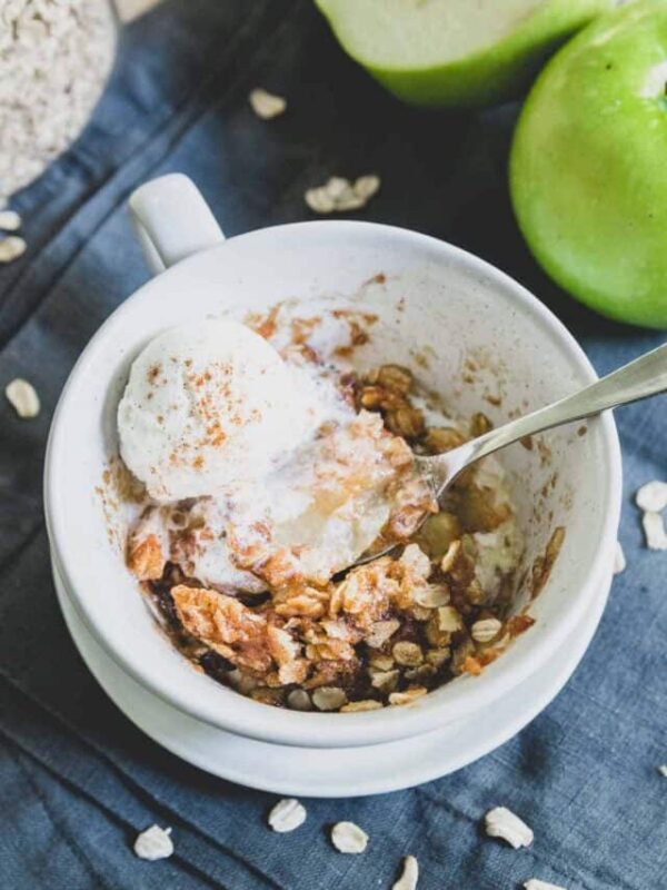 Microwave apple crisp with vanilla ice cream.