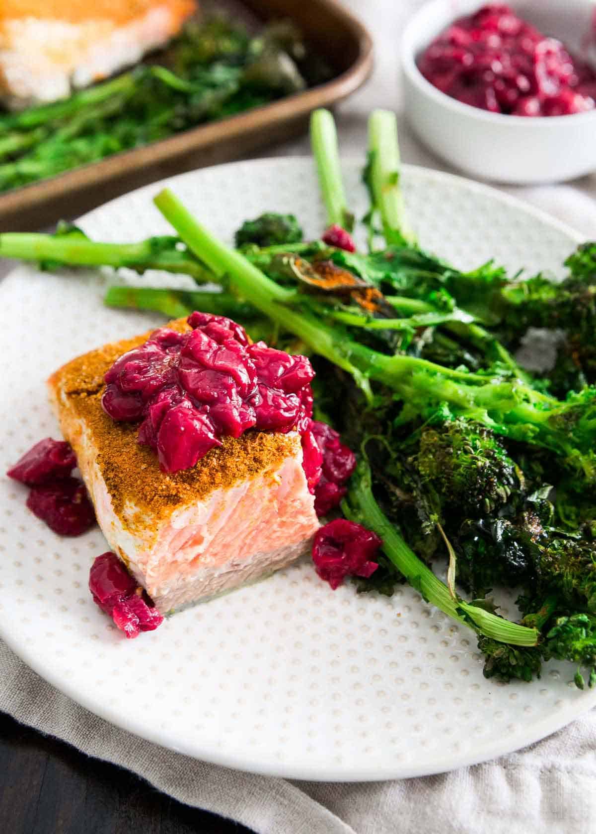 Serve this turmeric salmon and roasted broccoli rabe with a quick and easy tart cherry garlic sauce.