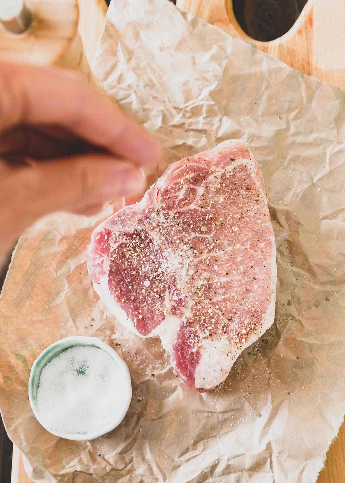 Simply seasoned with salt and pepper, these skillet pork chops are juicy and full of flavor.