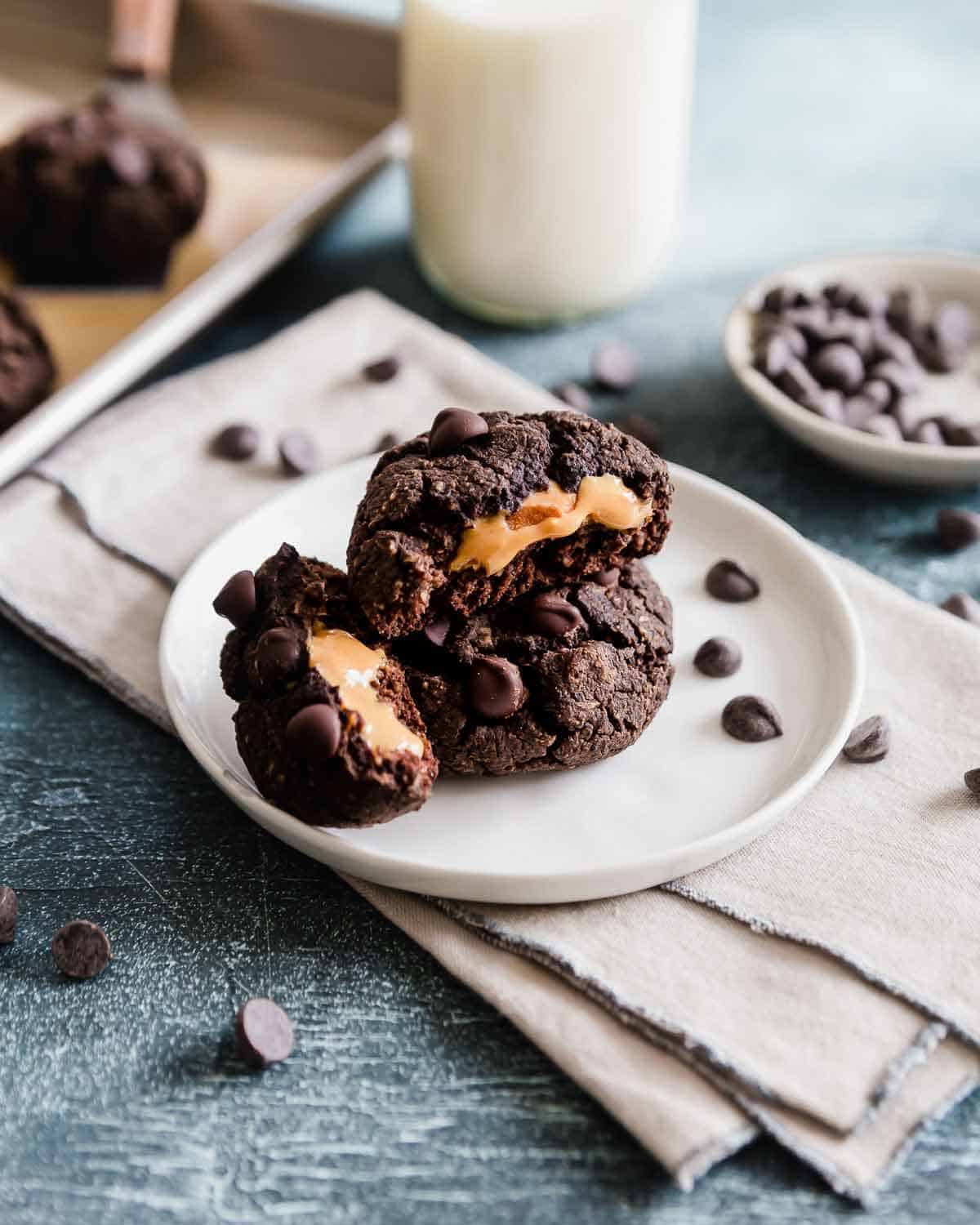These black bean cookies are stuffed with creamy peanut butter for a decadent and gooey center. They're a healthier, nutritious and gluten-free way to indulge!