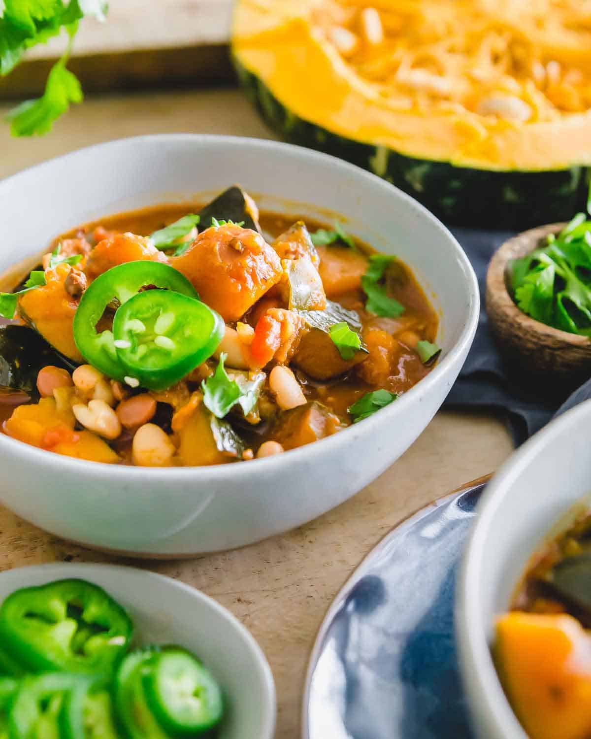 Kabocha squash chili with pinto and white beans is a filling and flavorful meal for the colder months.