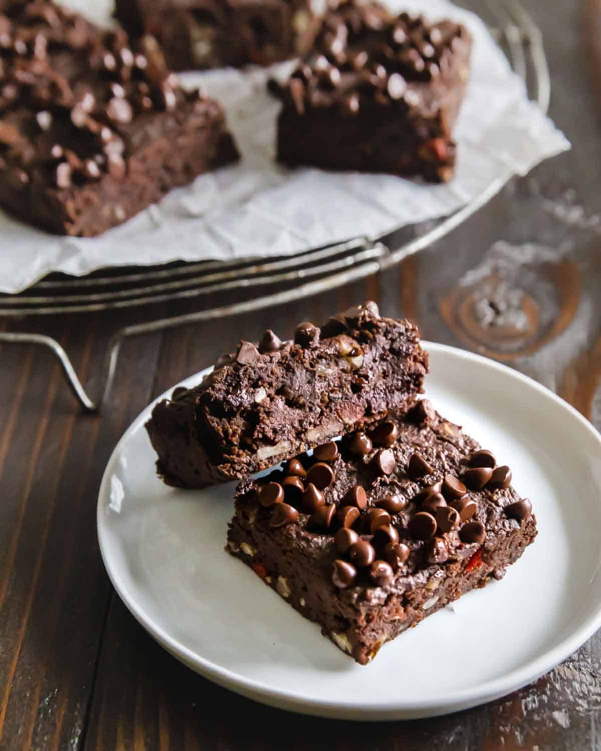 Intensely fudgy vegan brownies made with black beans require just 1 bowl and 20 minutes to bake for the ultimate healthy chocolate dessert.