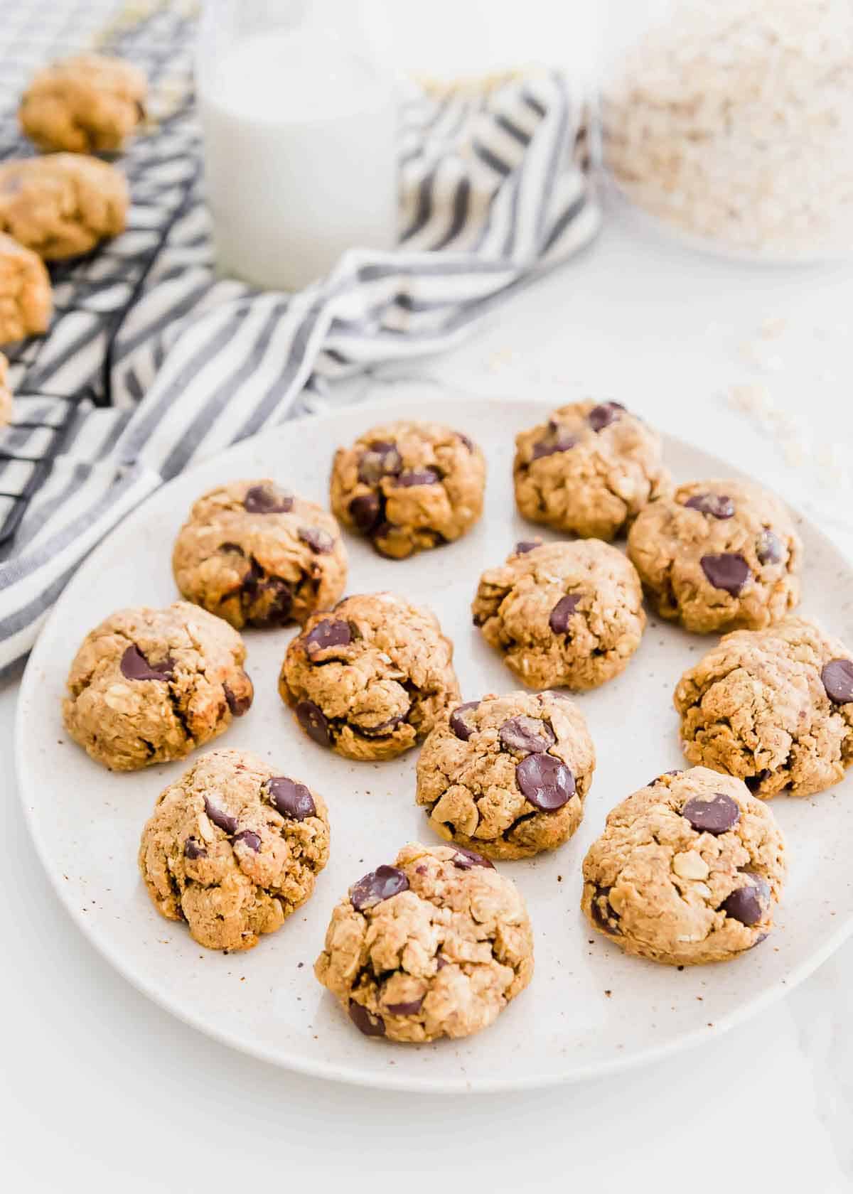 These oatmeal chocolate chip cookies made with almond pulp from homemade almond milk are an easy gluten-free, vegan dessert while healthy enough for an afternoon snack!