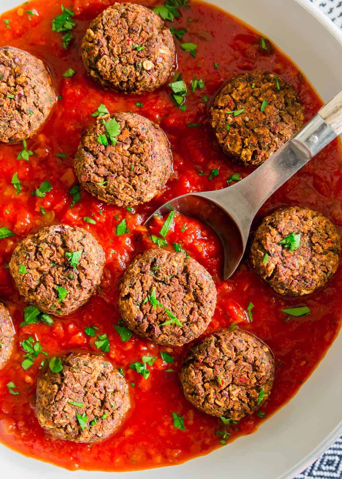 These Italian flavored black bean meatballs are a delicious and hearty plant based alternative to traditional meatballs. Serve with your favorite marinara sauce over pasta or zoodles for a comforting healthful meal.
