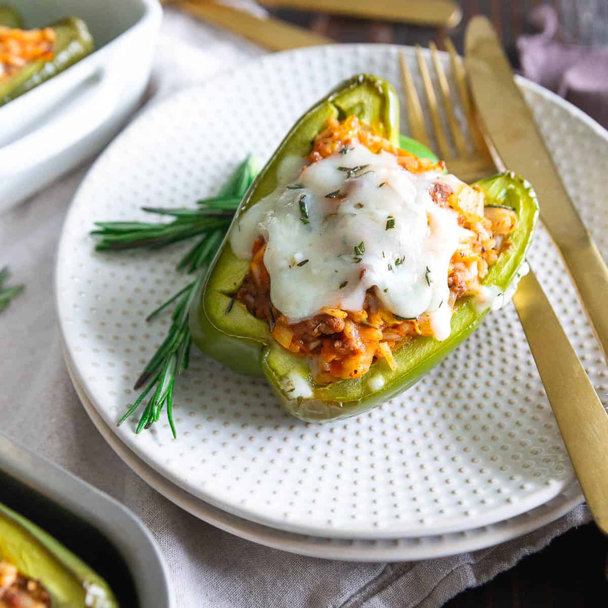 Lean ground bison stuffed green peppers.